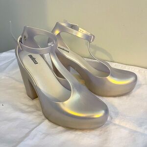 BRAND NEW Melissa iridescent t-strap pumps size 8 US.